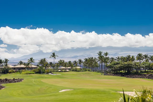 a view of a large swimming pool and lake view