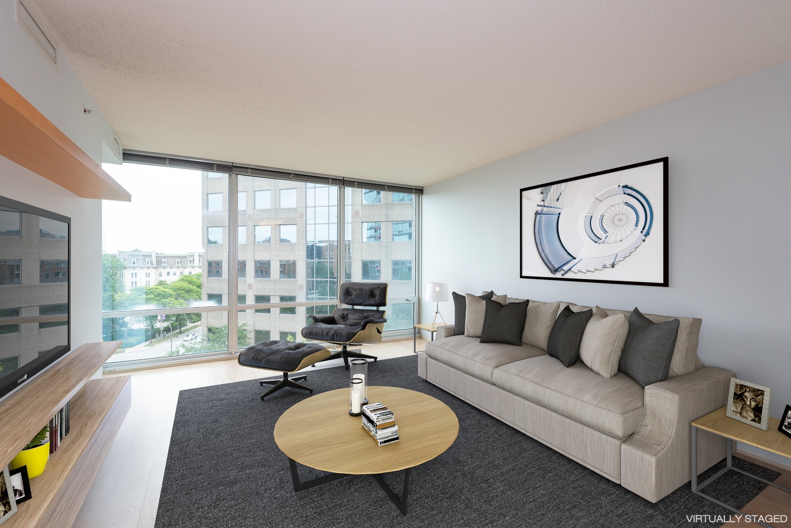 800 Elgin Road, Unit 711 Evanston, IL 60201 - Photo 4 of 18 a living room with furniture and a large window
