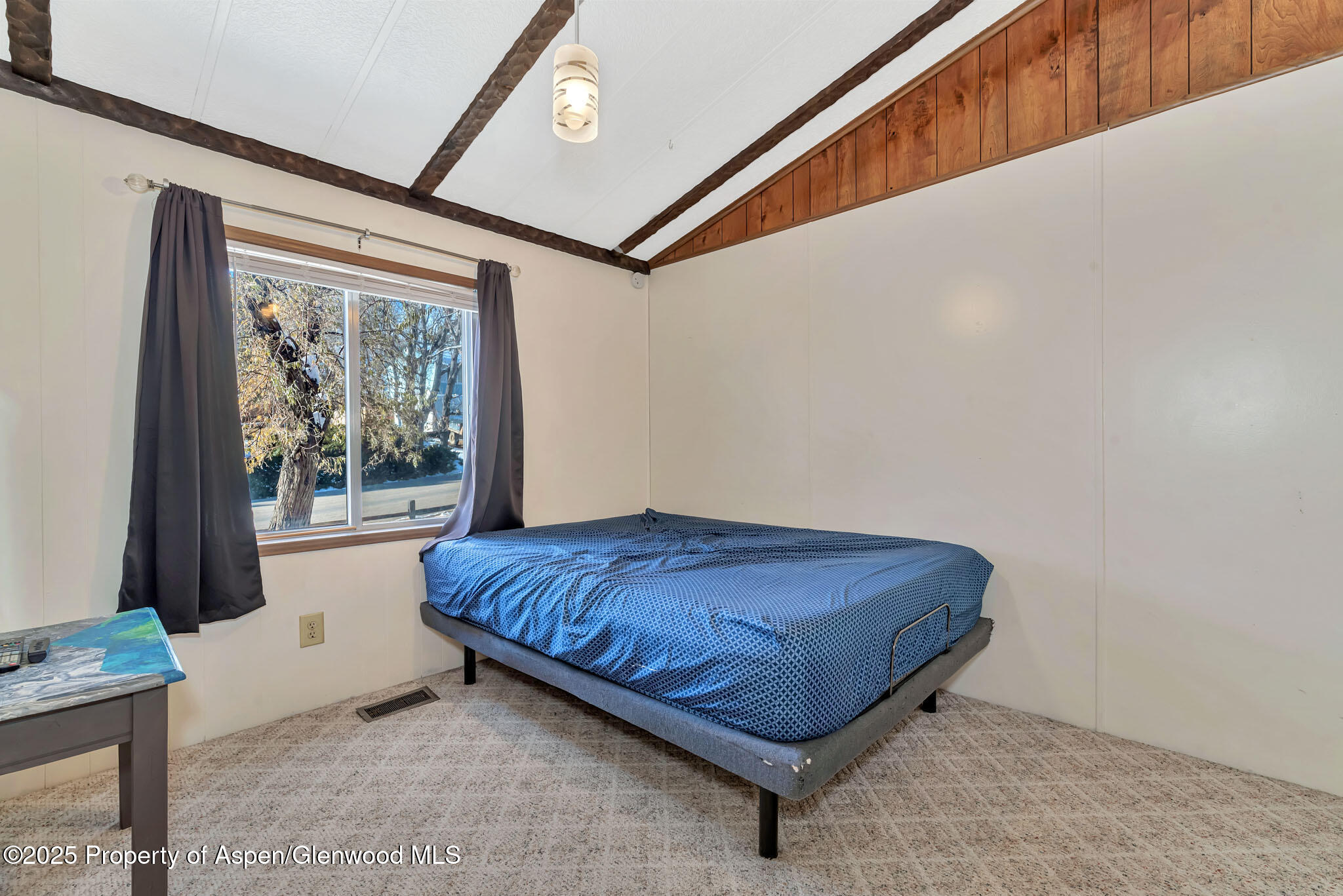 759 Ashley Road Craig, CO 81625 - Photo 15 of 44 a room with a bed and a window