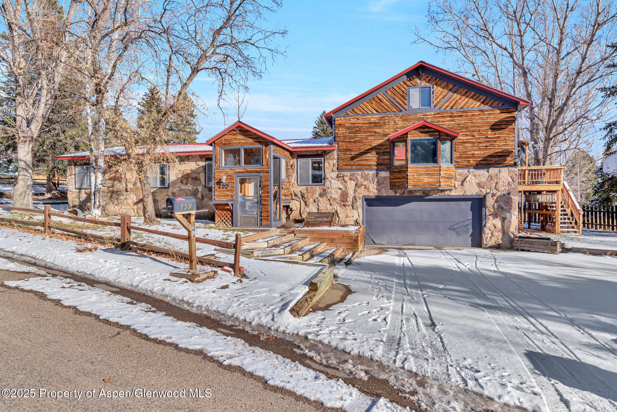 759 Ashley Road Craig, CO 81625 - Photo 2 of 44 a front view of a house with swimming pool