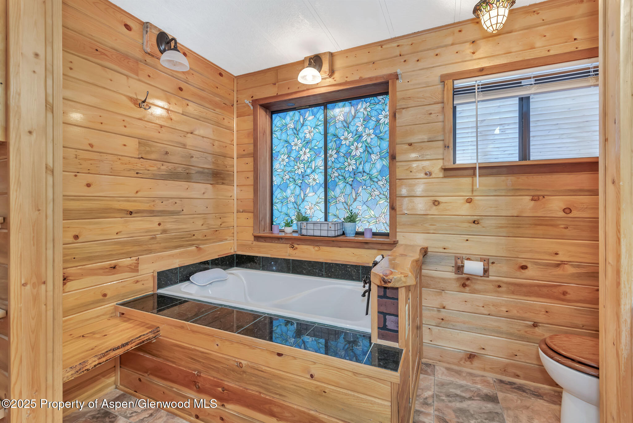 759 Ashley Road Craig, CO 81625 - Photo 22 of 44 a view of walk in closet and living room