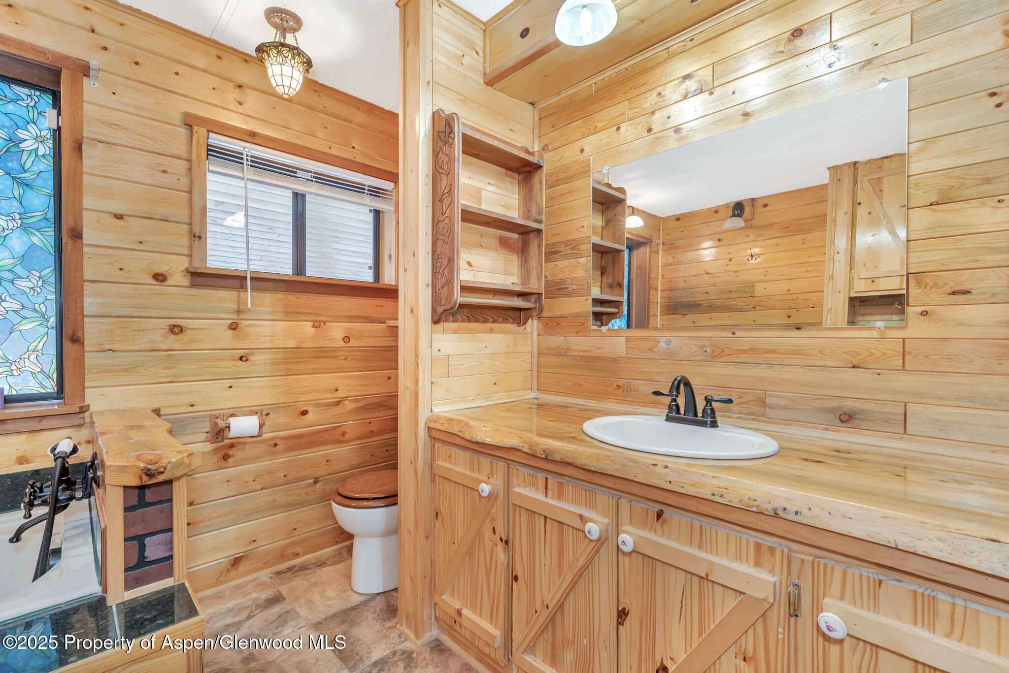 759 Ashley Road Craig, CO 81625 - Photo 23 of 44 a bathroom with a sink a toilet and shower