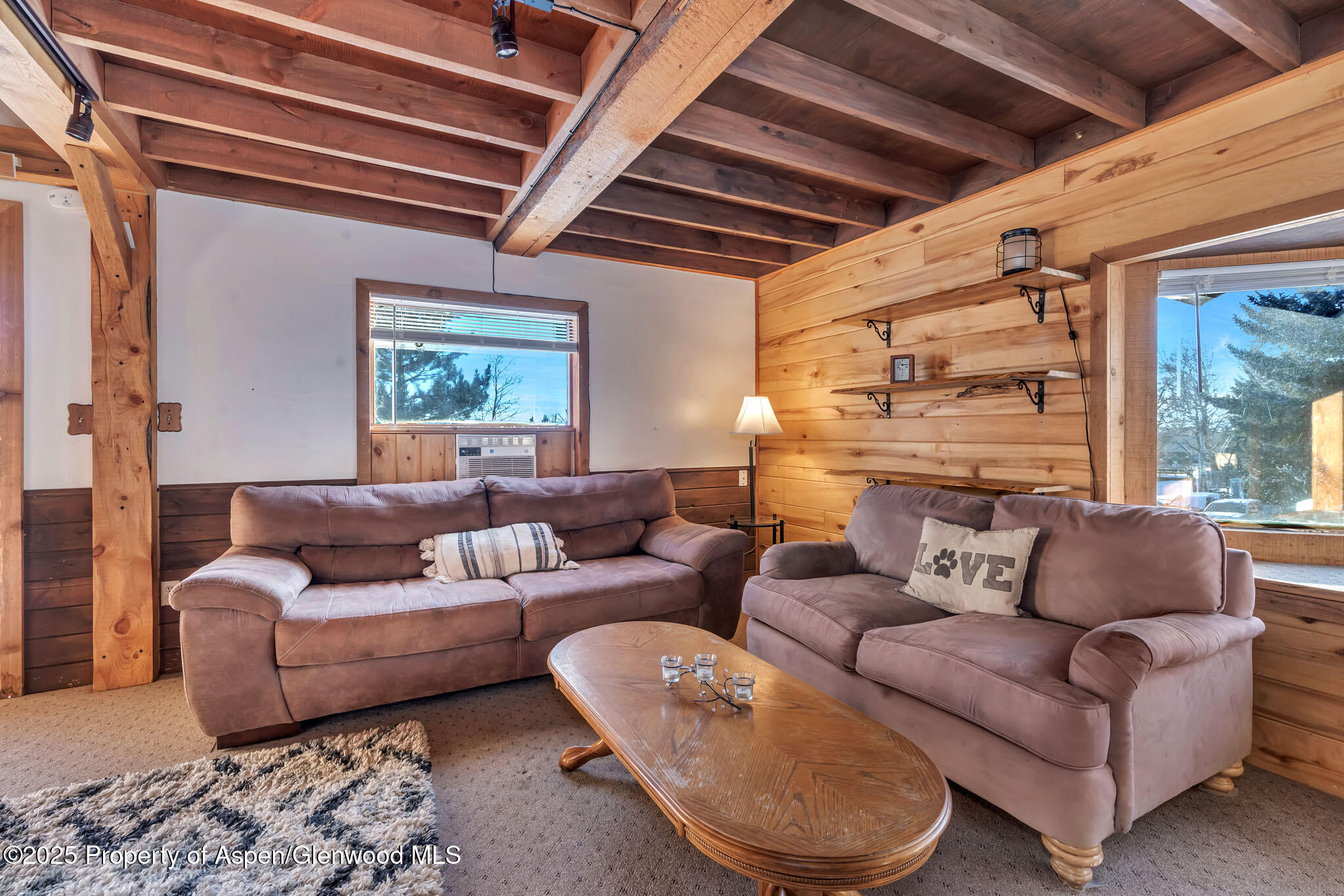 759 Ashley Road Craig, CO 81625 - Photo 31 of 44 a living room with furniture and a large window