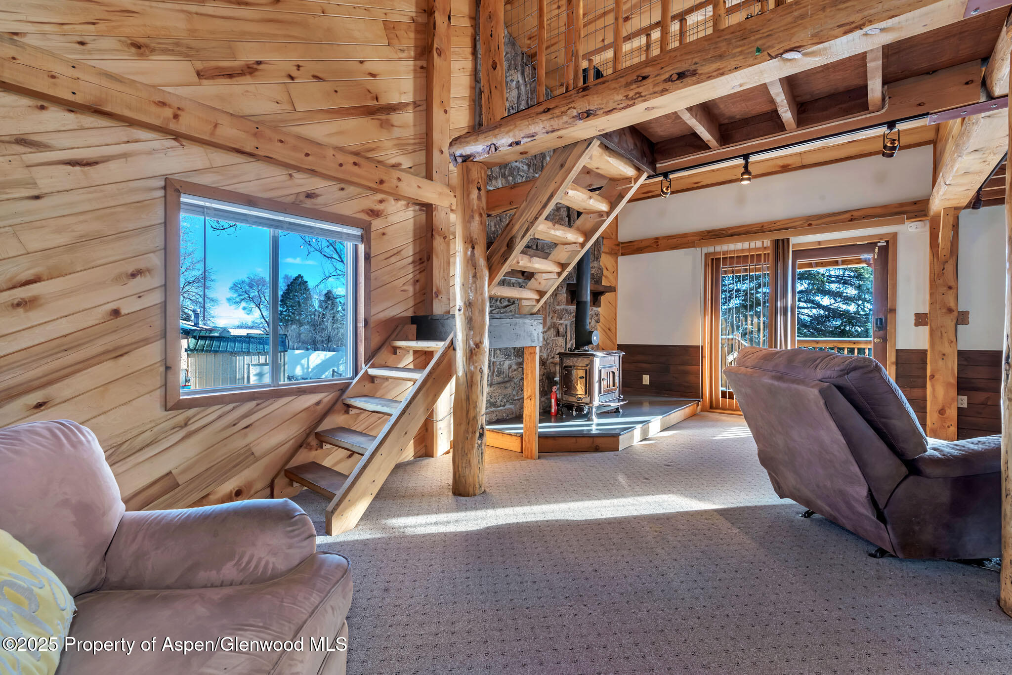 759 Ashley Road Craig, CO 81625 - Photo 34 of 44 a view of a couches with wooden floor and in front of house