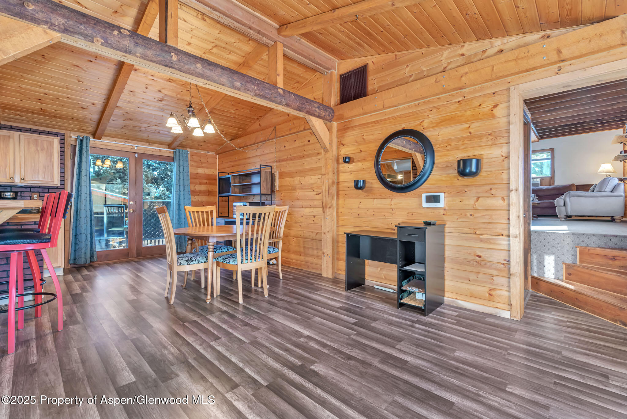 759 Ashley Road Craig, CO 81625 - Photo 5 of 44 a view of a dining room with furniture and wooden floor