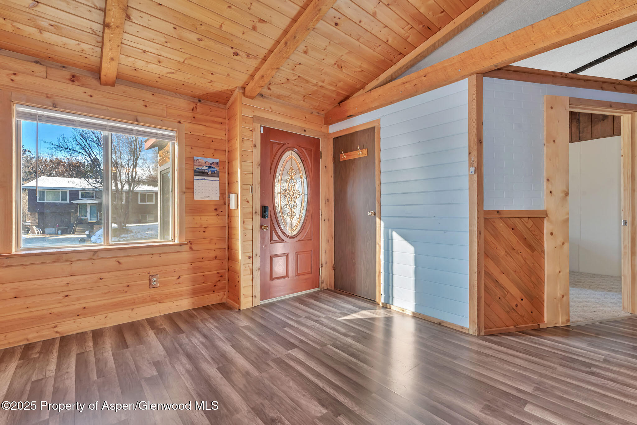 759 Ashley Road Craig, CO 81625 - Photo 6 of 44 a view of empty room with wooden floor