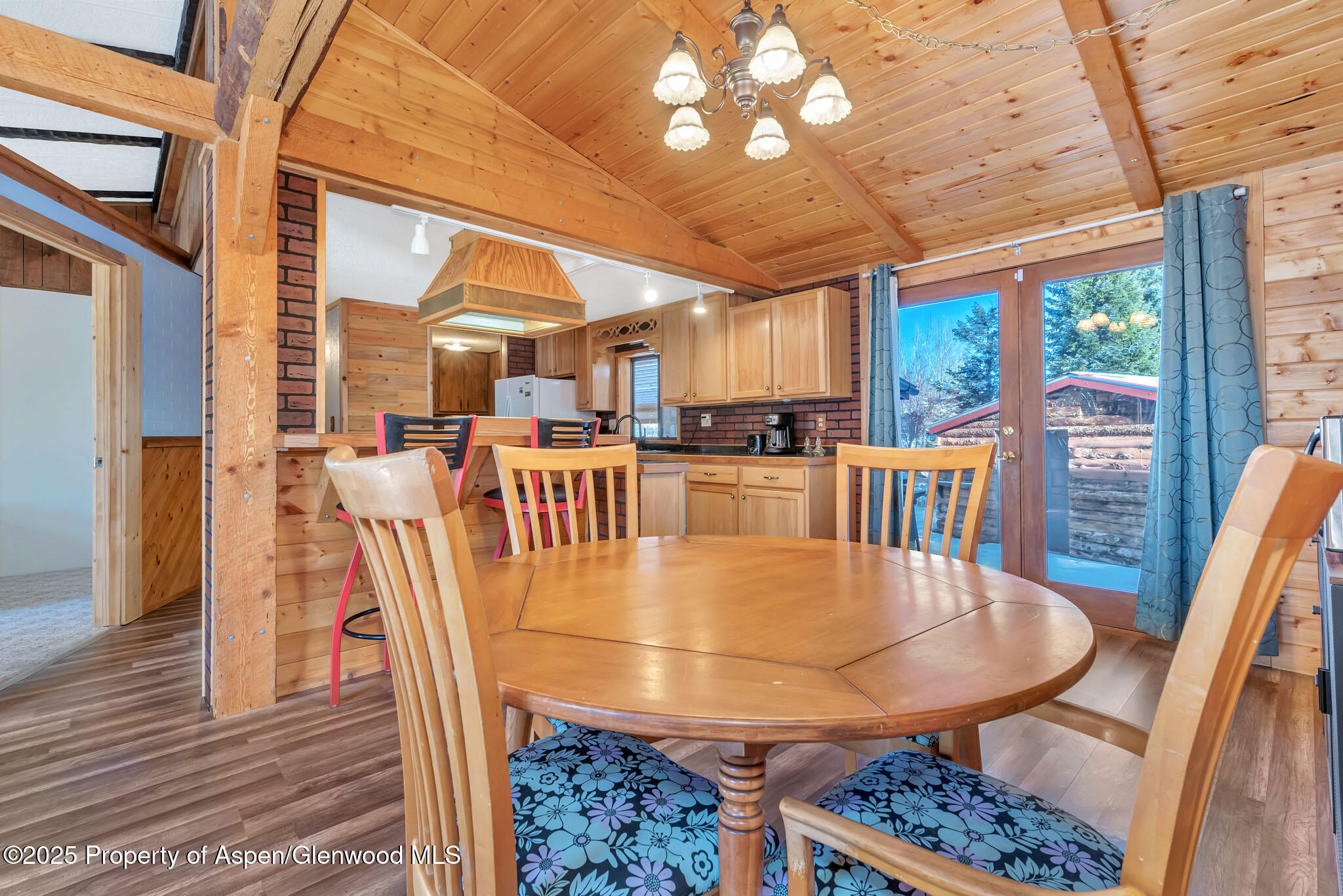 759 Ashley Road Craig, CO 81625 - Photo 8 of 44 a view of a dining room with furniture window and wooden floor