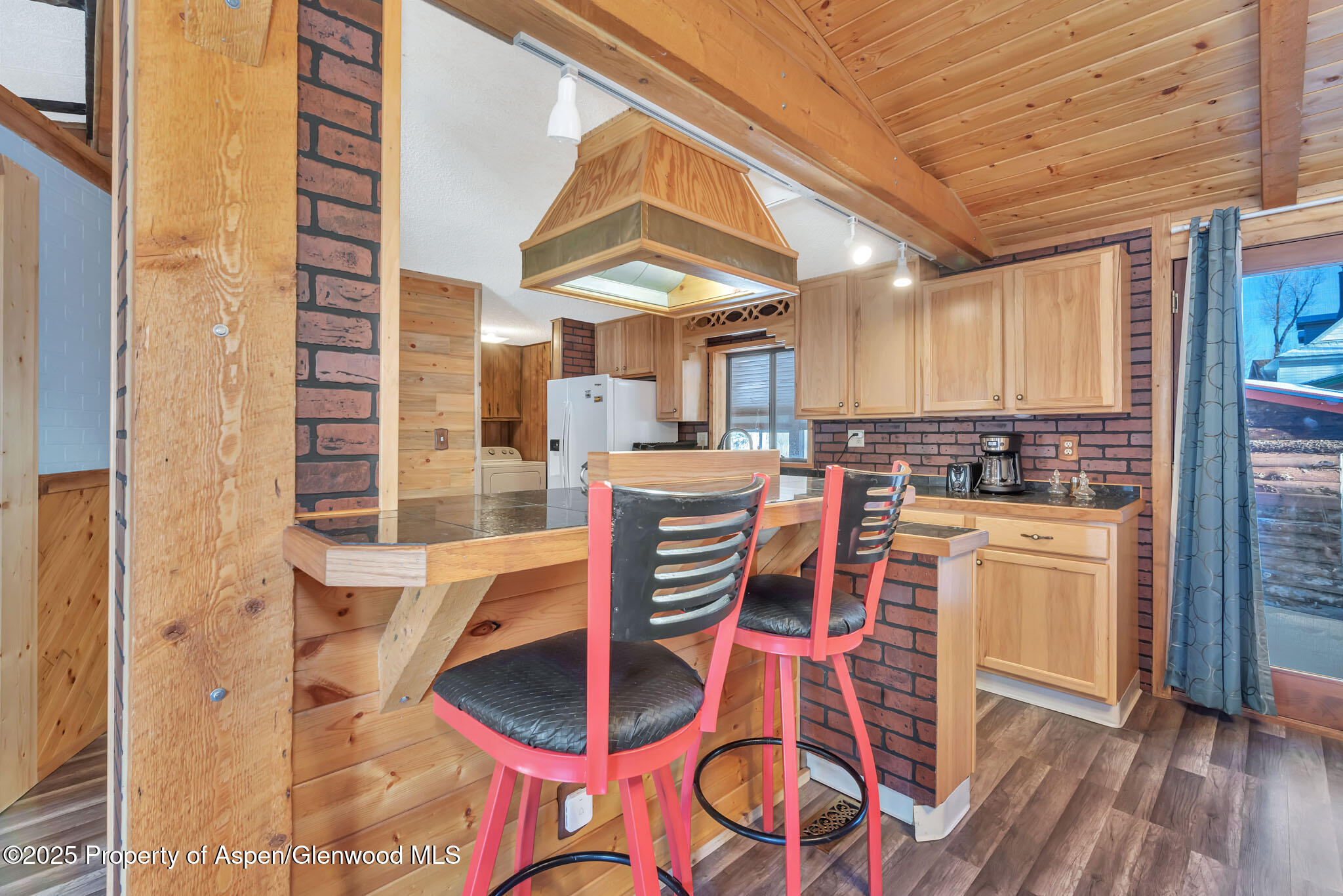 759 Ashley Road Craig, CO 81625 - Photo 9 of 44 a dining room with furniture and wooden floor