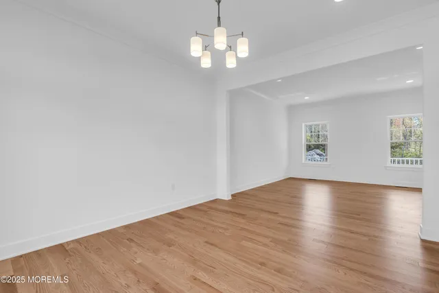 a living room with furniture fireplace and flat screen tv