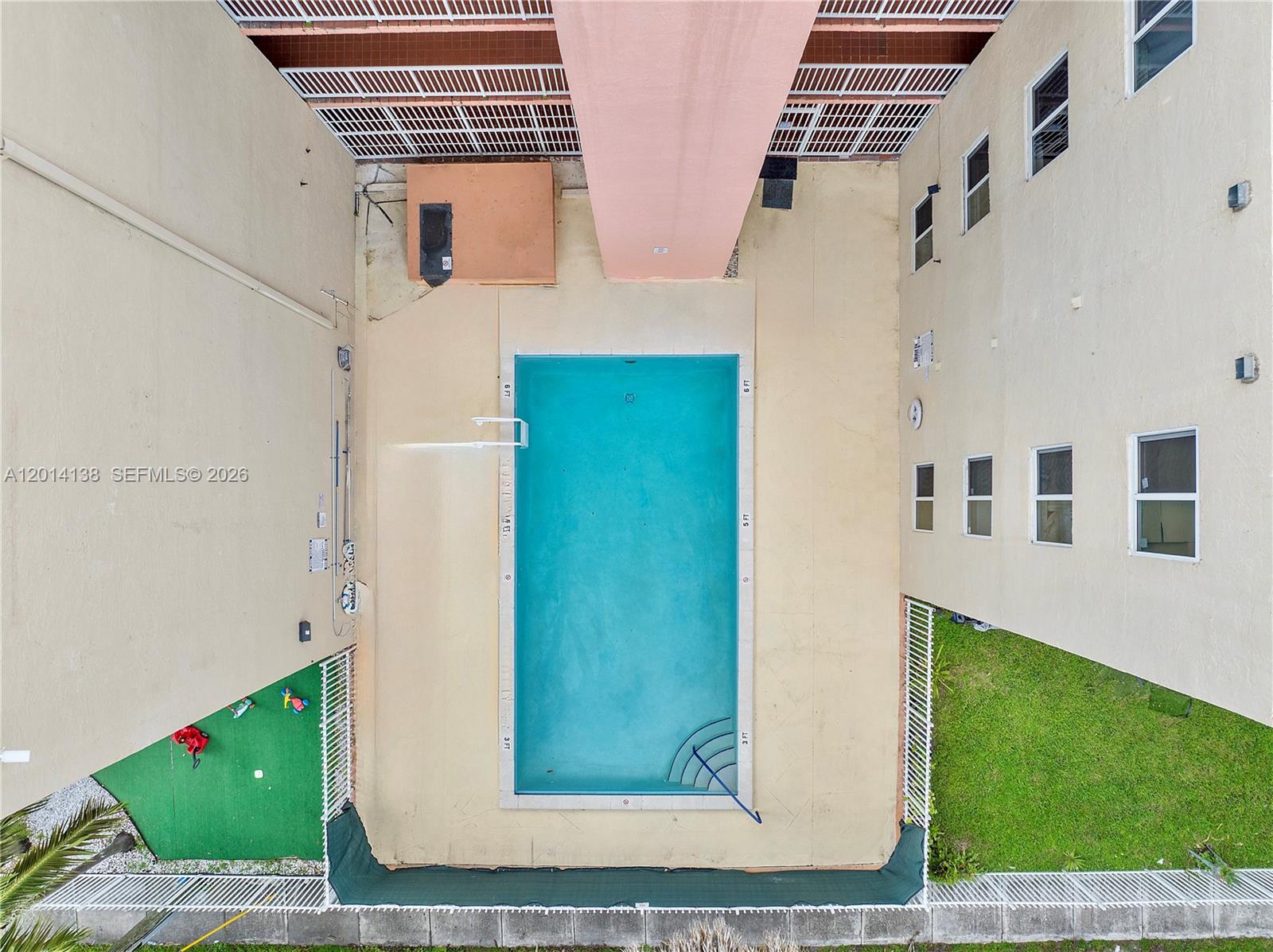 2400 Northwest 16th St Road Miami, FL 33125 - Photo 47 of 47 a view of entryway with garden