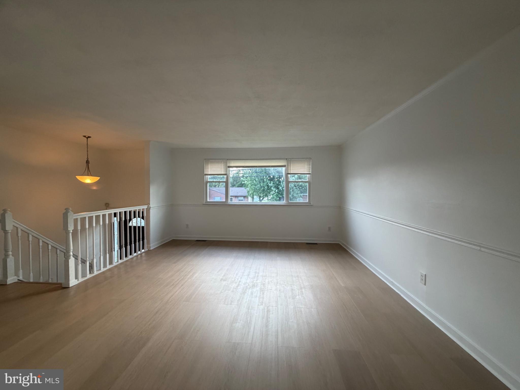 4007 McDonogh Road Randallstown, MD 21133 - Photo 2 of 20 Spacious, sunlit living area awaits.