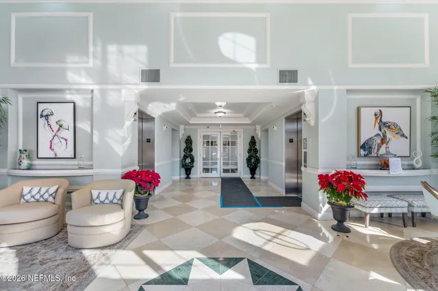 a view of a swimming pool with a lounge chairs