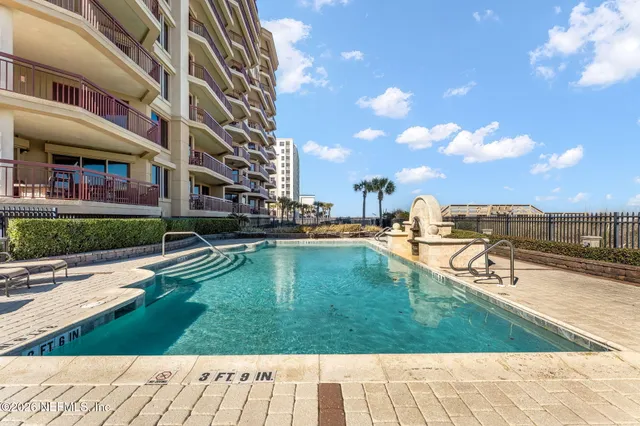 a view of a garden with houses