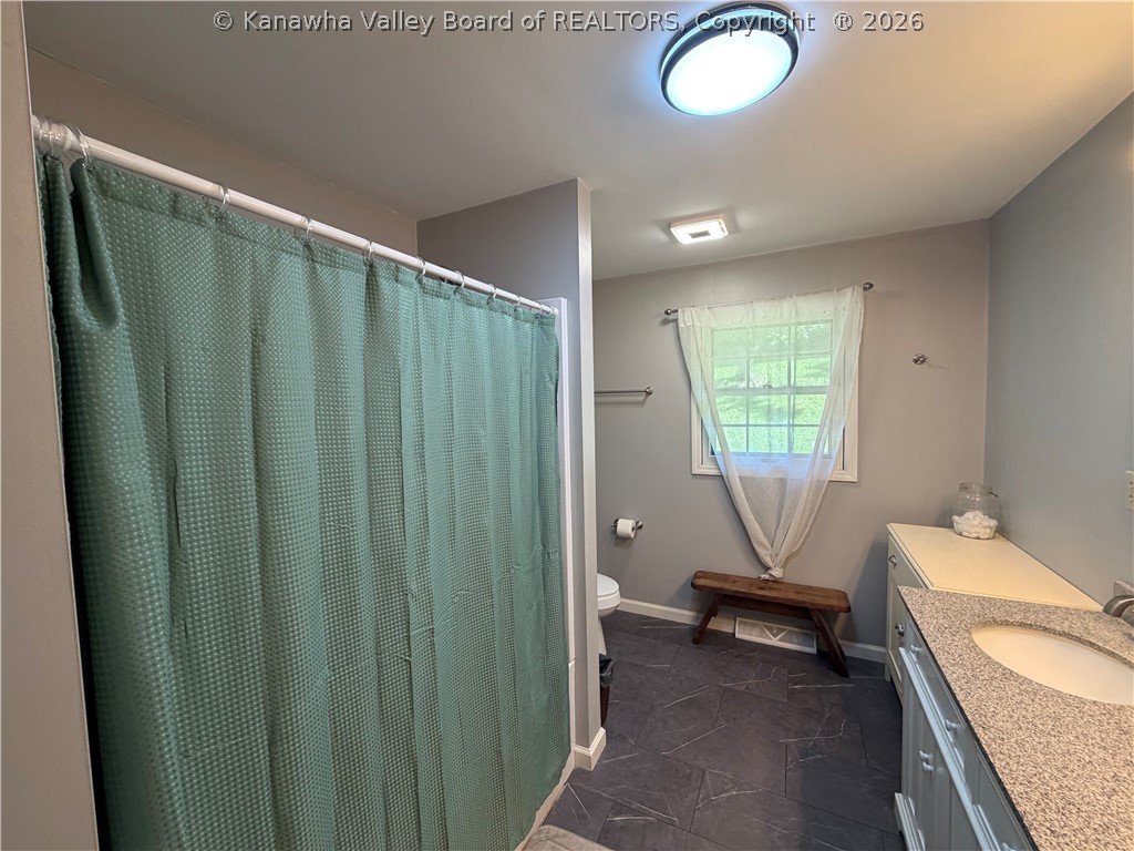 435 Charleston Road Point Pleasant, WV 25550 - Photo 14 of 24 Main level bathroom