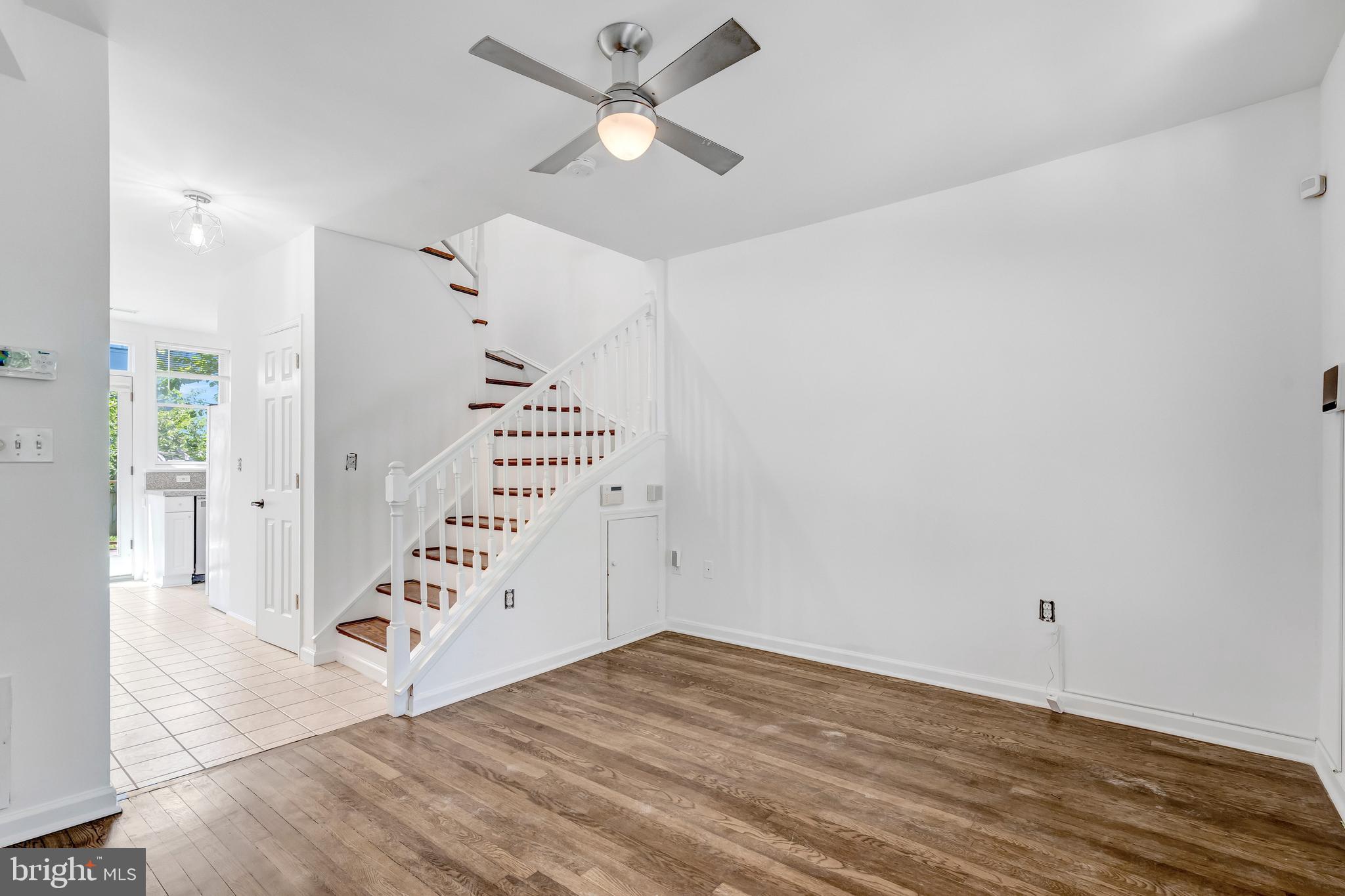 1749 L Street Northeast Washington, DC 20002 - Photo 5 of 24 wooden floor in an empty room