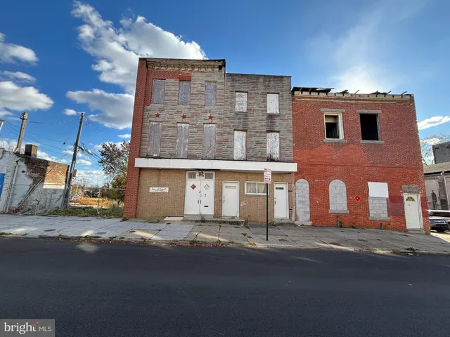 a front view of a building with road