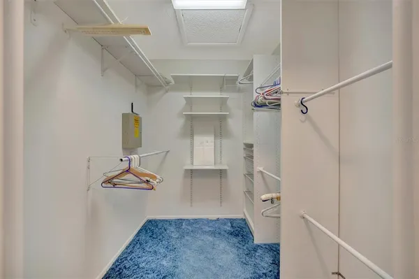 a view of an empty walk in closet