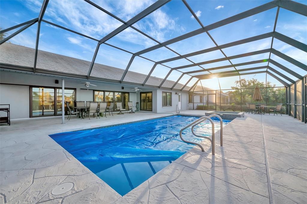 4859 Greencroft Road Sarasota, FL 34235 - Photo 37 of 39 a view of a swimming pool with a patio
