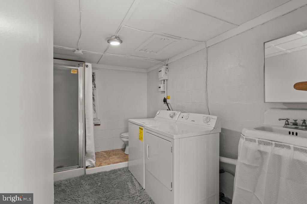 601 Country Club Road Rehoboth Beach, DE 19971 - Photo 19 of 28 Garage Apt. Bathroom and Laundry