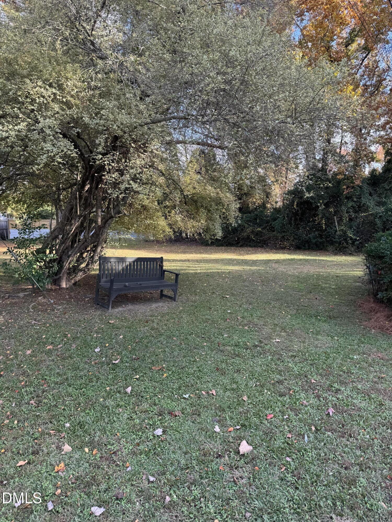 101 Joy Street Dunn, NC 28334 - Photo 14 of 14 a view of backyard with outdoor space