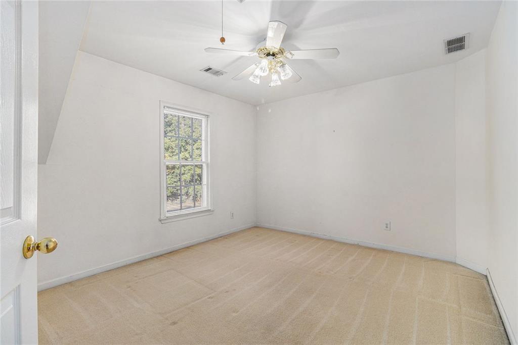 2653 Danforth Lane Decatur, GA 30033 - Photo 18 of 30 an empty room with windows and fan