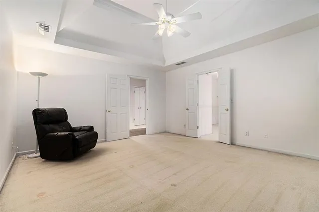 a bathroom with a sink a mirror and a shower