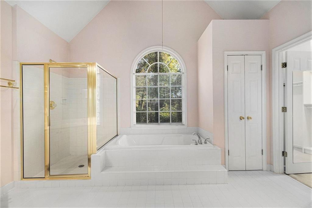 2653 Danforth Lane Decatur, GA 30033 - Photo 23 of 30 a bathroom with a bathtub and shower