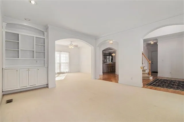 a view of deck with a table and chairs