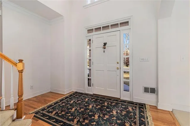 an empty room with a fireplace