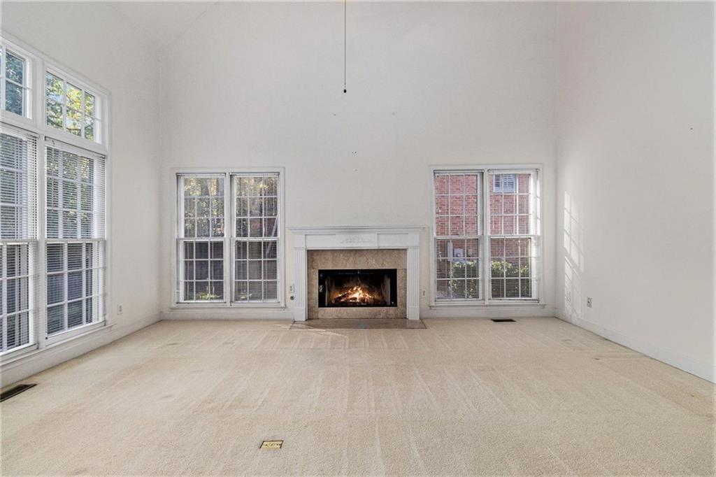 2653 Danforth Lane Decatur, GA 30033 - Photo 5 of 30 an empty room with a fireplace