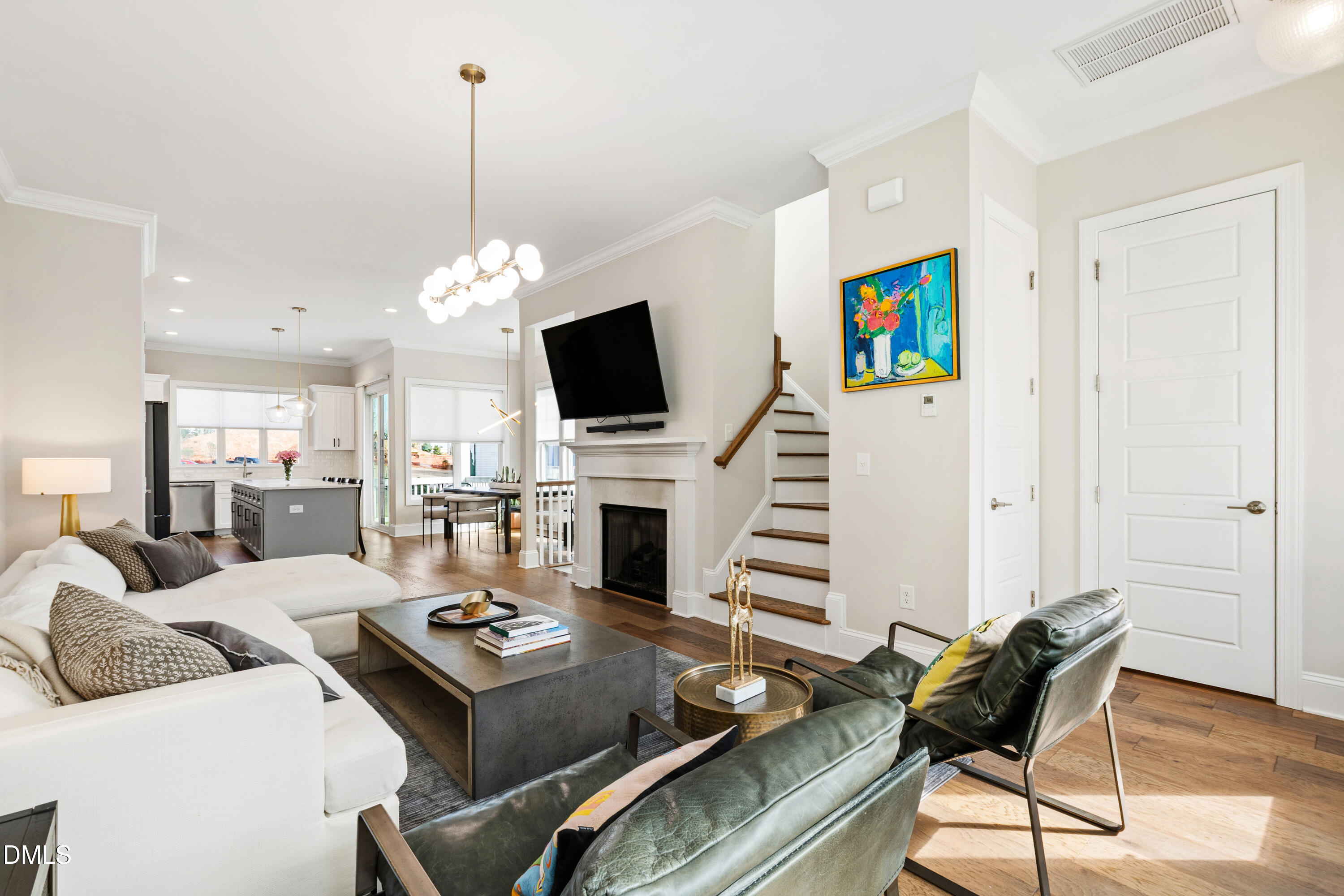 4934 Trek Lane Raleigh, NC 27606 - Photo 16 of 35 a living room with furniture and a flat screen tv