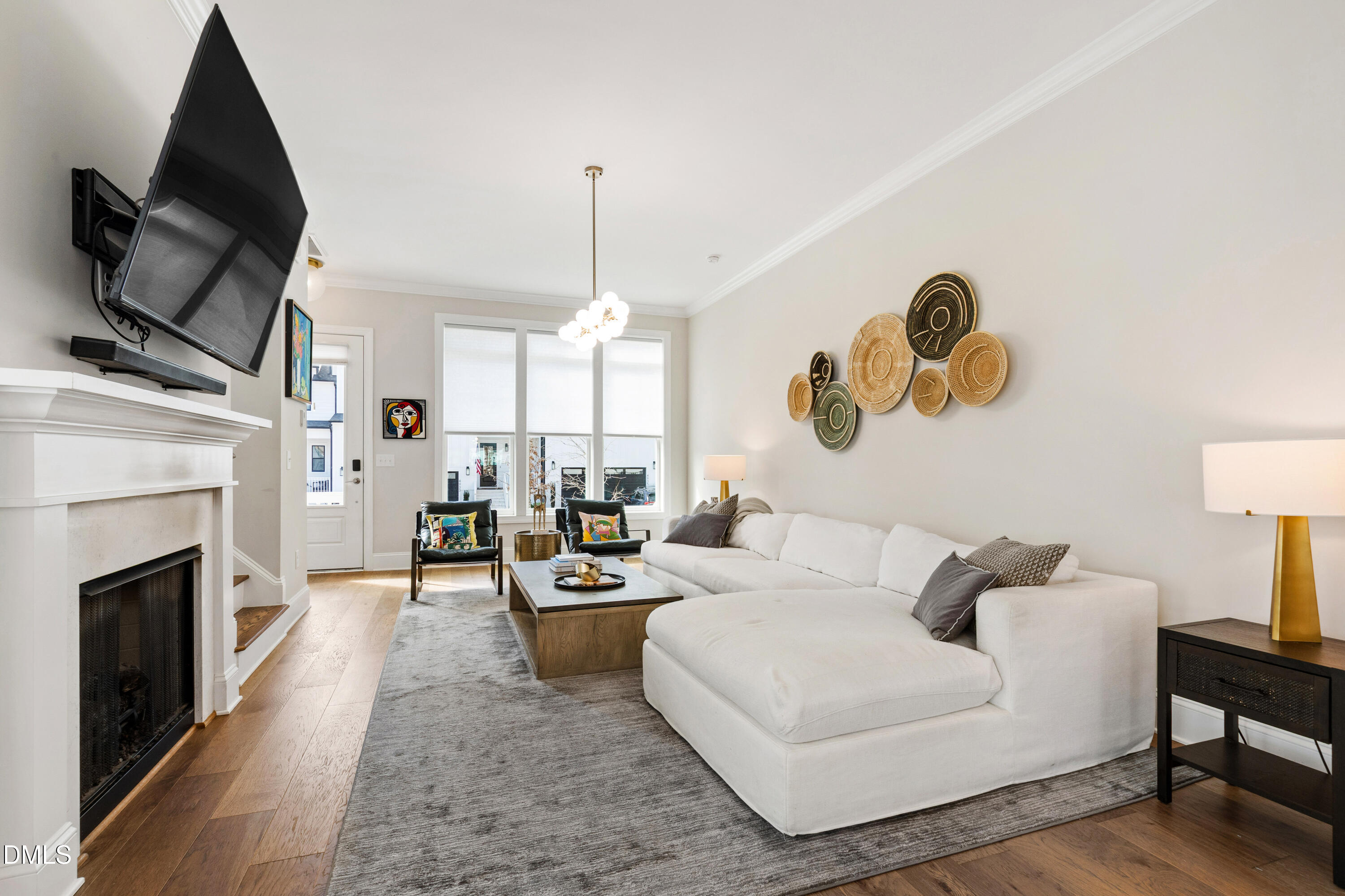 4934 Trek Lane Raleigh, NC 27606 - Photo 18 of 35 a living room with fireplace furniture and a flat screen tv