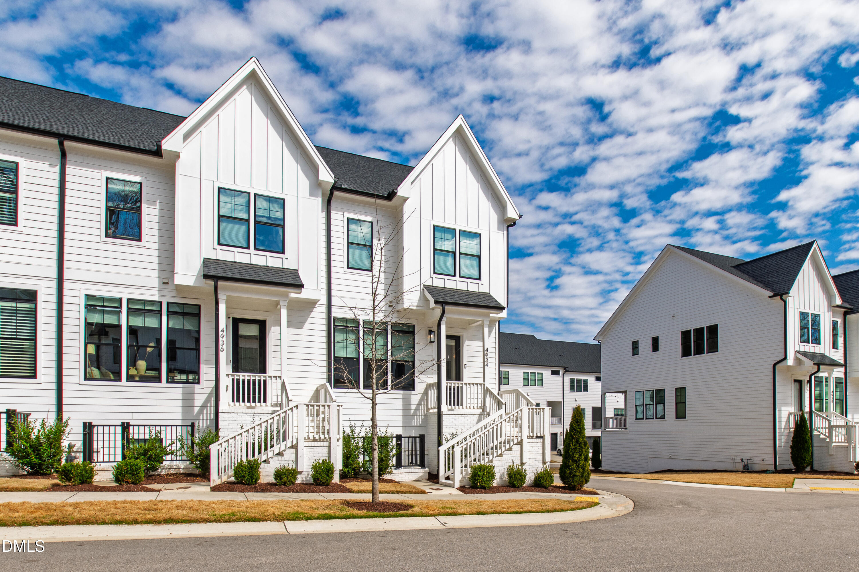 4934 Trek Lane Raleigh, NC 27606 - Photo 2 of 35 a front view of a house with a yard