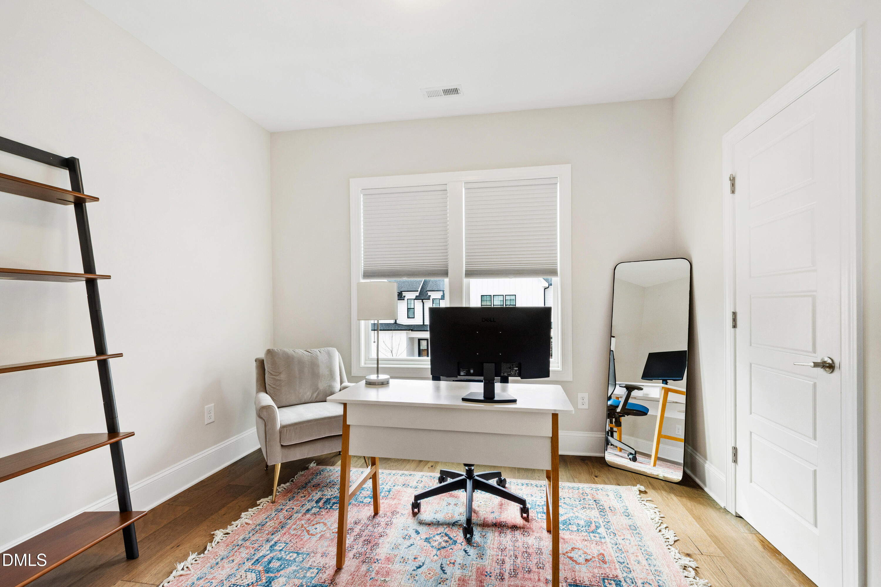 4934 Trek Lane Raleigh, NC 27606 - Photo 27 of 35 a view of a workspace with furniture and a bathroom