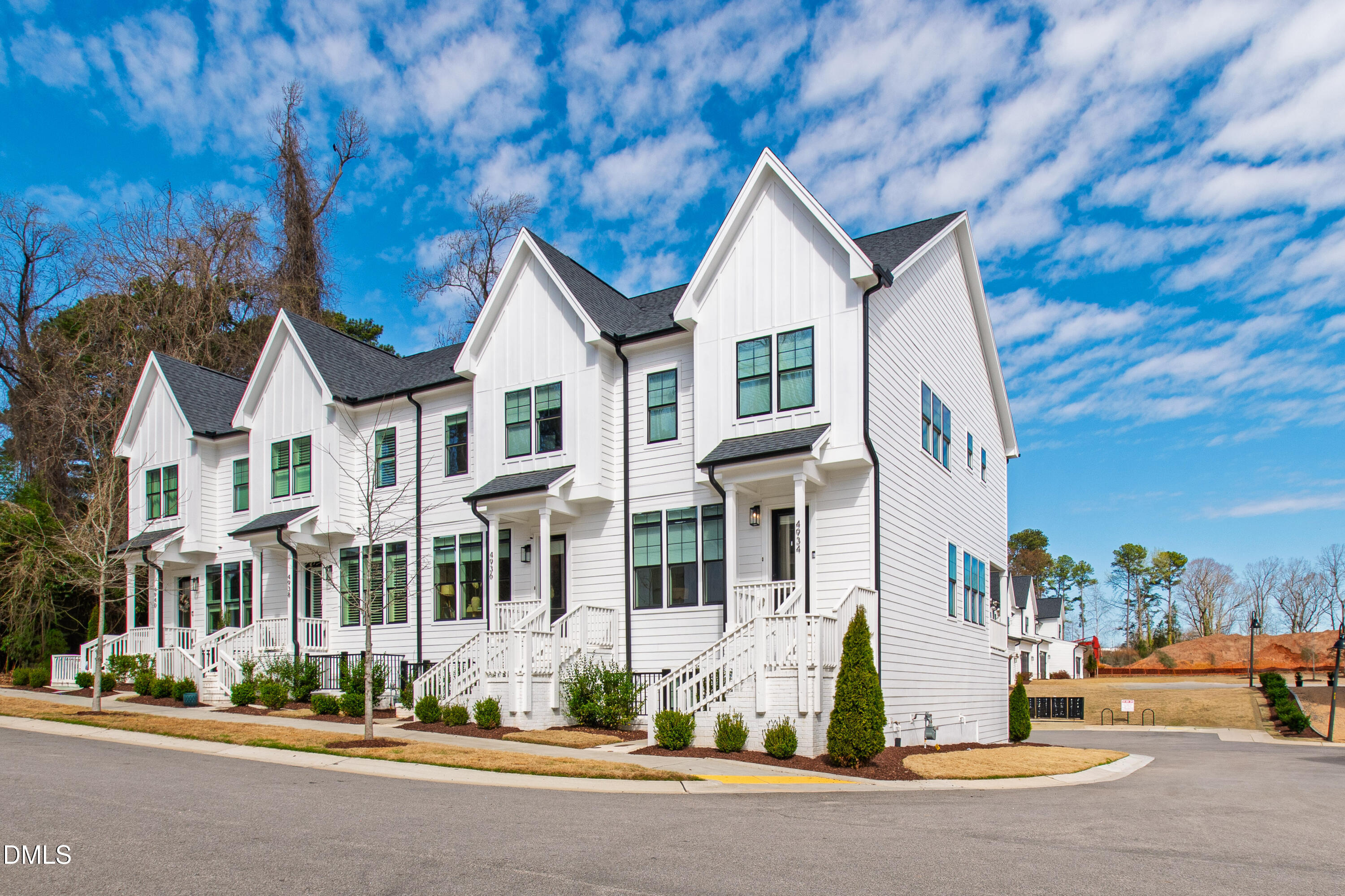 4934 Trek Lane Raleigh, NC 27606 - Photo 3 of 35 a front view of a house with a street