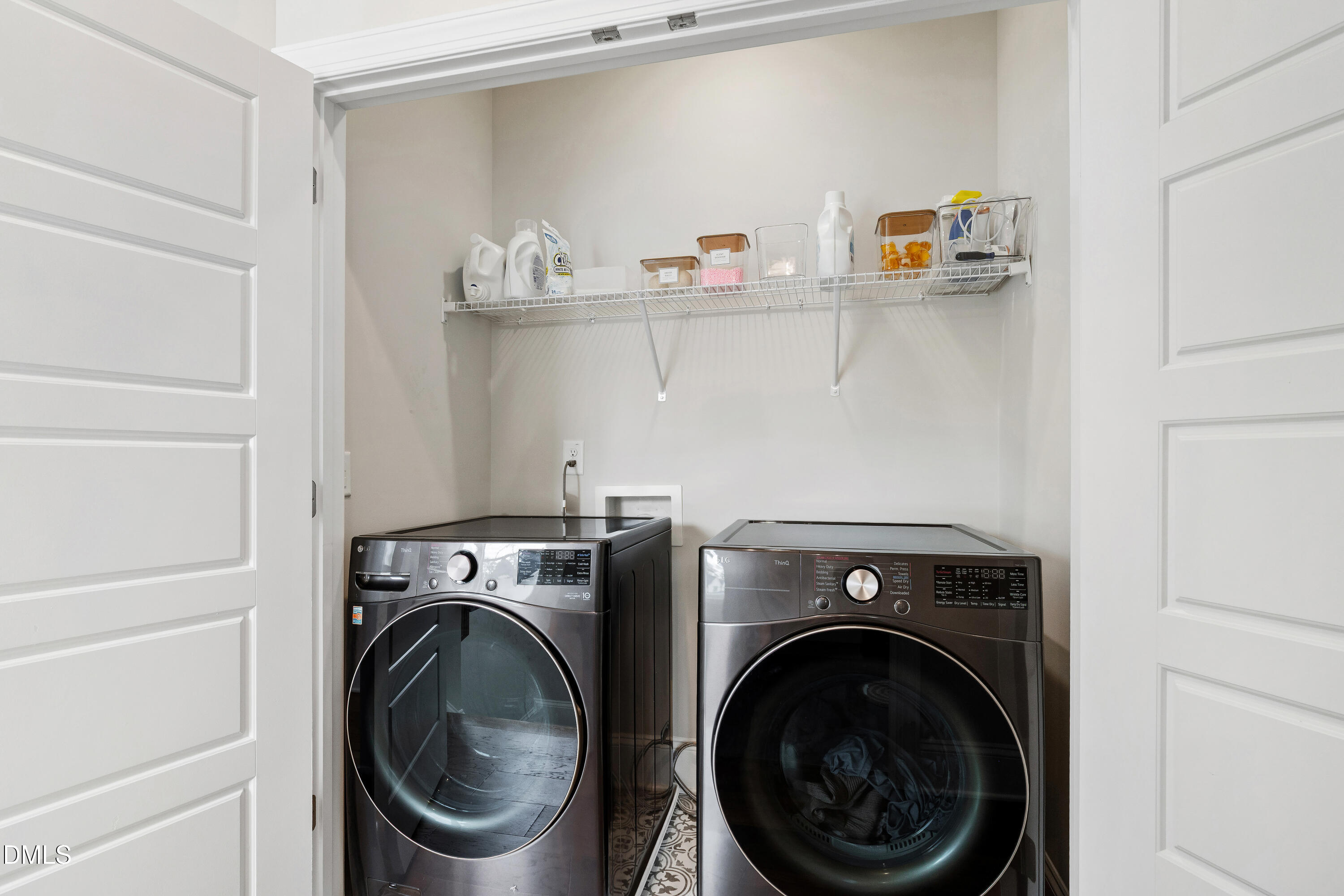 4934 Trek Lane Raleigh, NC 27606 - Photo 31 of 35 a utility room with sink dryer and washer