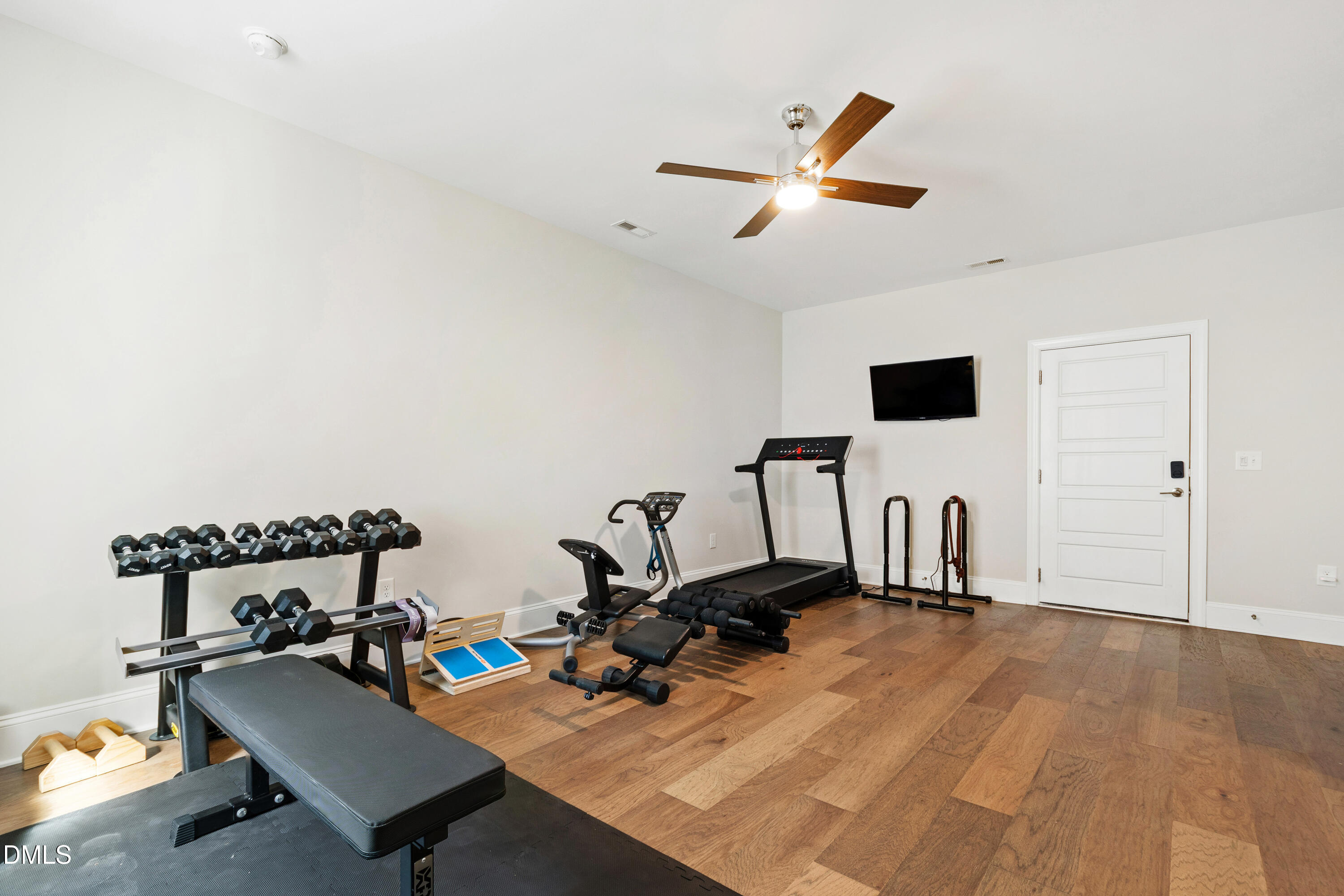 4934 Trek Lane Raleigh, NC 27606 - Photo 32 of 35 a view of a workspace with wooden floor