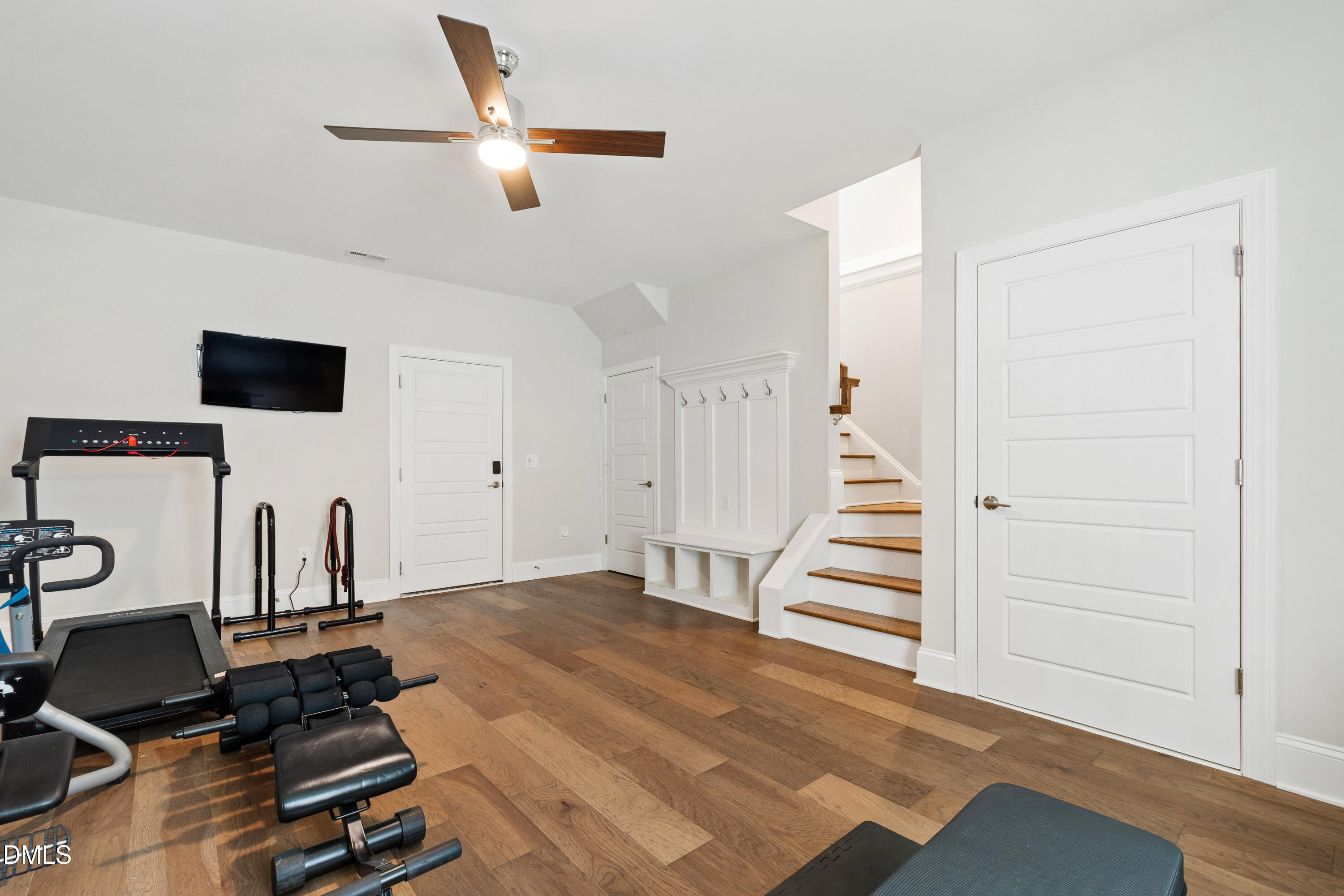 4934 Trek Lane Raleigh, NC 27606 - Photo 33 of 35 a bedroom with a bed and a chandelier
