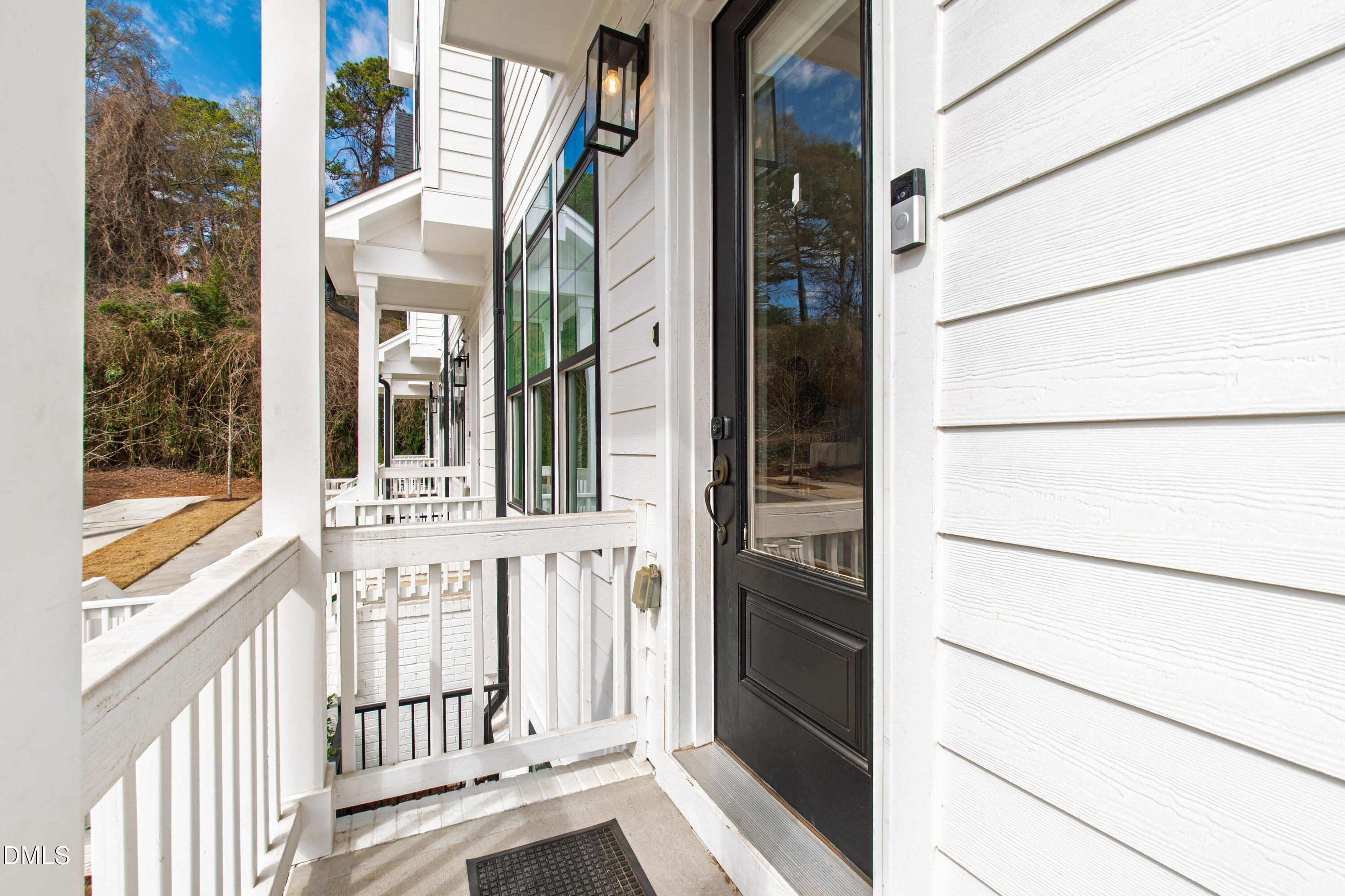 4934 Trek Lane Raleigh, NC 27606 - Photo 5 of 35 a view of a brick house with a large window