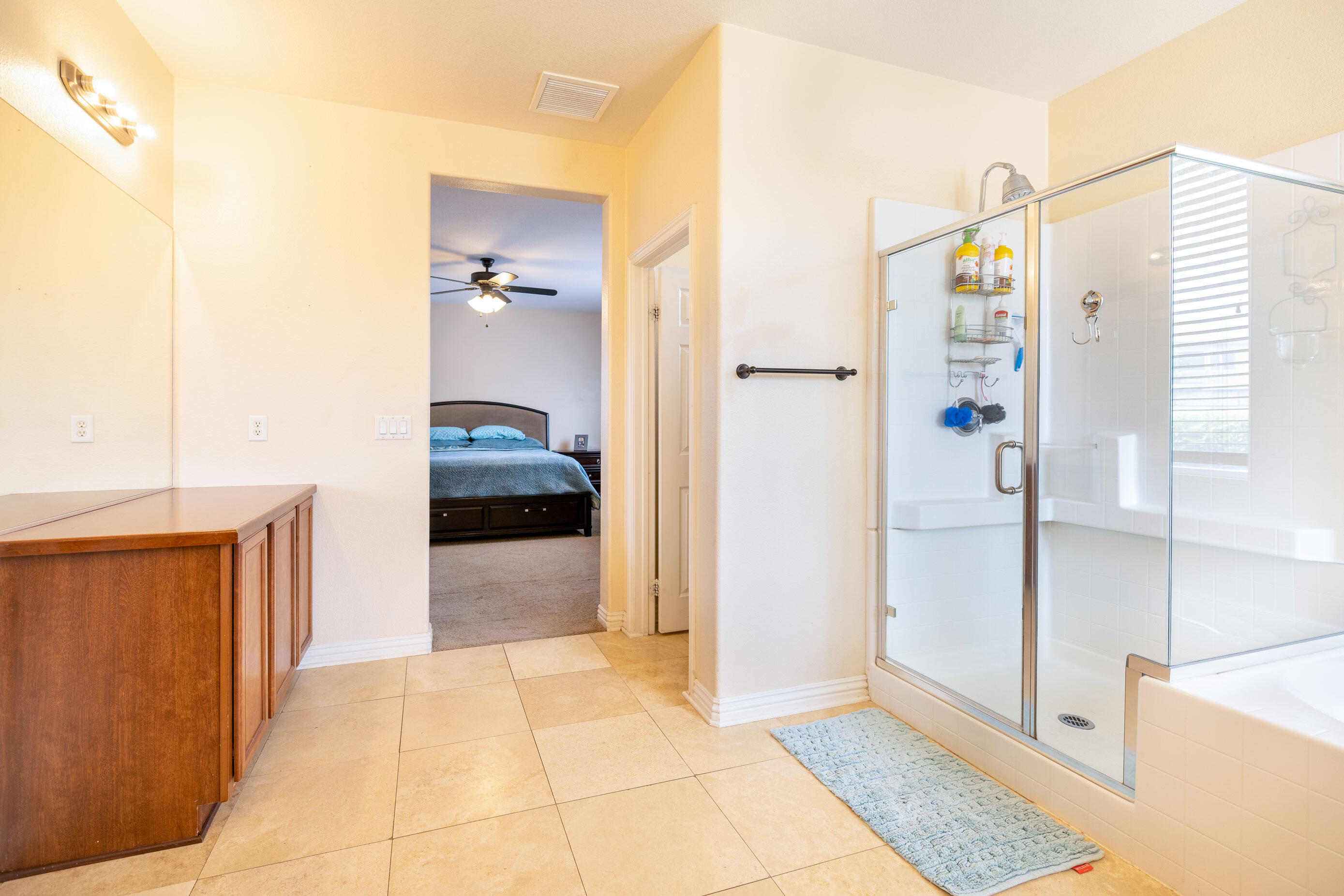 80292 Whitehaven Drive Indio, CA 92203 - Photo 12 of 25 a bathroom with a tub and a shower