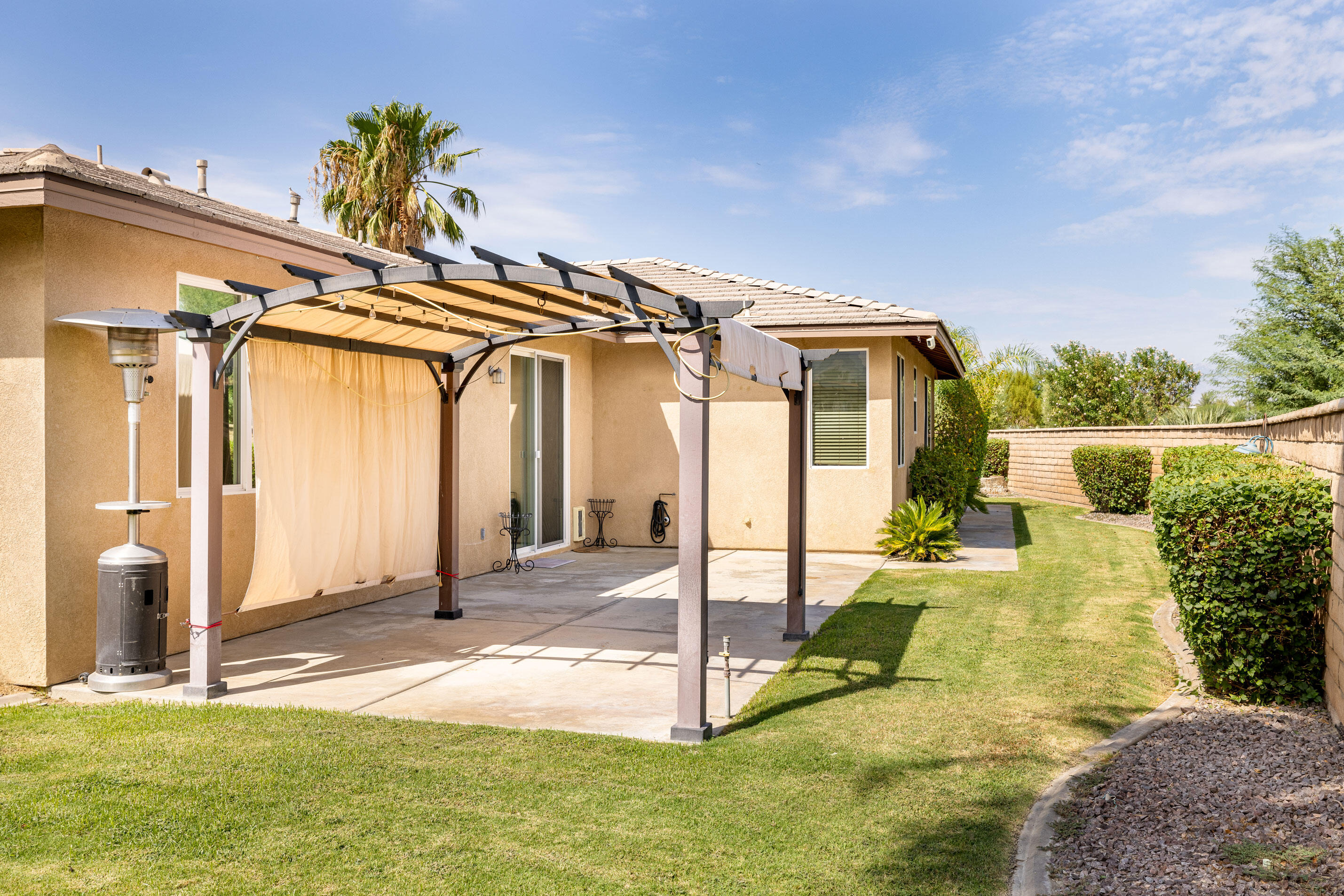 80292 Whitehaven Drive Indio, CA 92203 - Photo 20 of 25 a view of a house with a outdoor space
