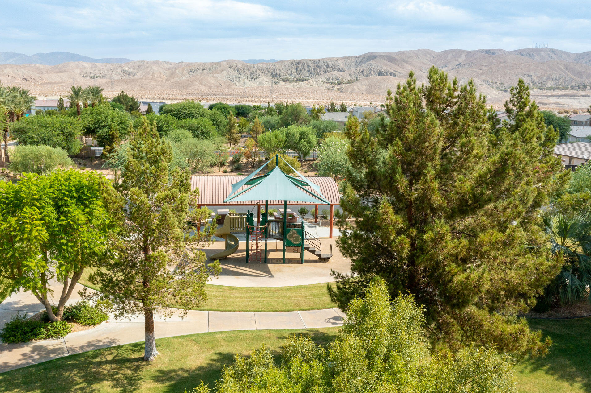 80292 Whitehaven Drive Indio, CA 92203 - Photo 23 of 25 a view of a town with mountains in the background