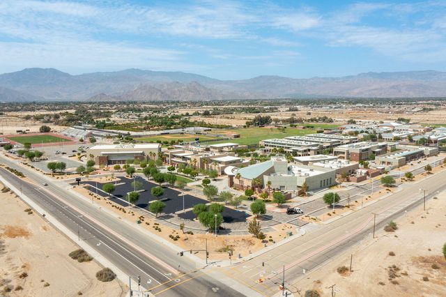 a view of city with ocean
