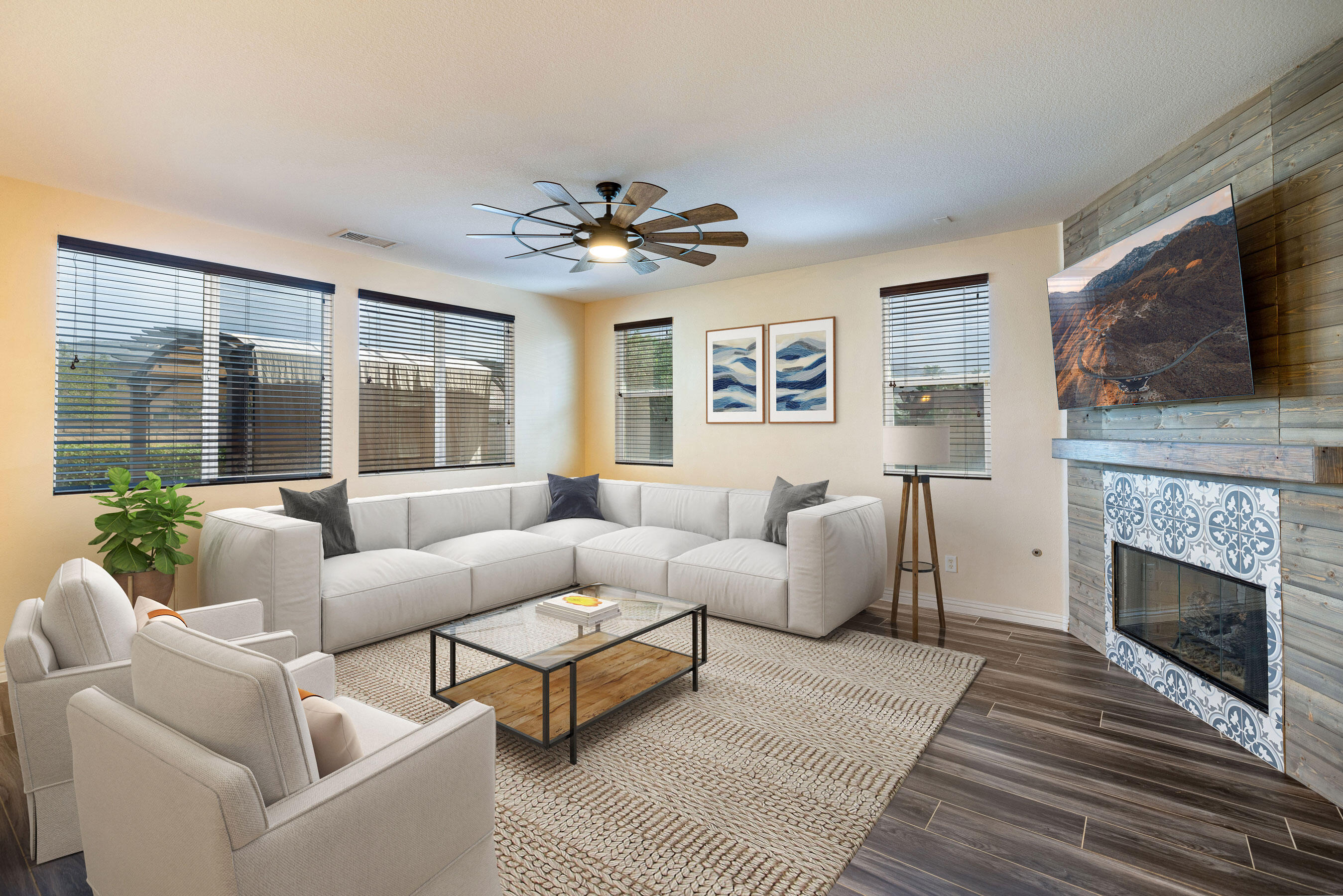 80292 Whitehaven Drive Indio, CA 92203 - Photo 3 of 25 a living room with furniture a flat screen tv and a fireplace