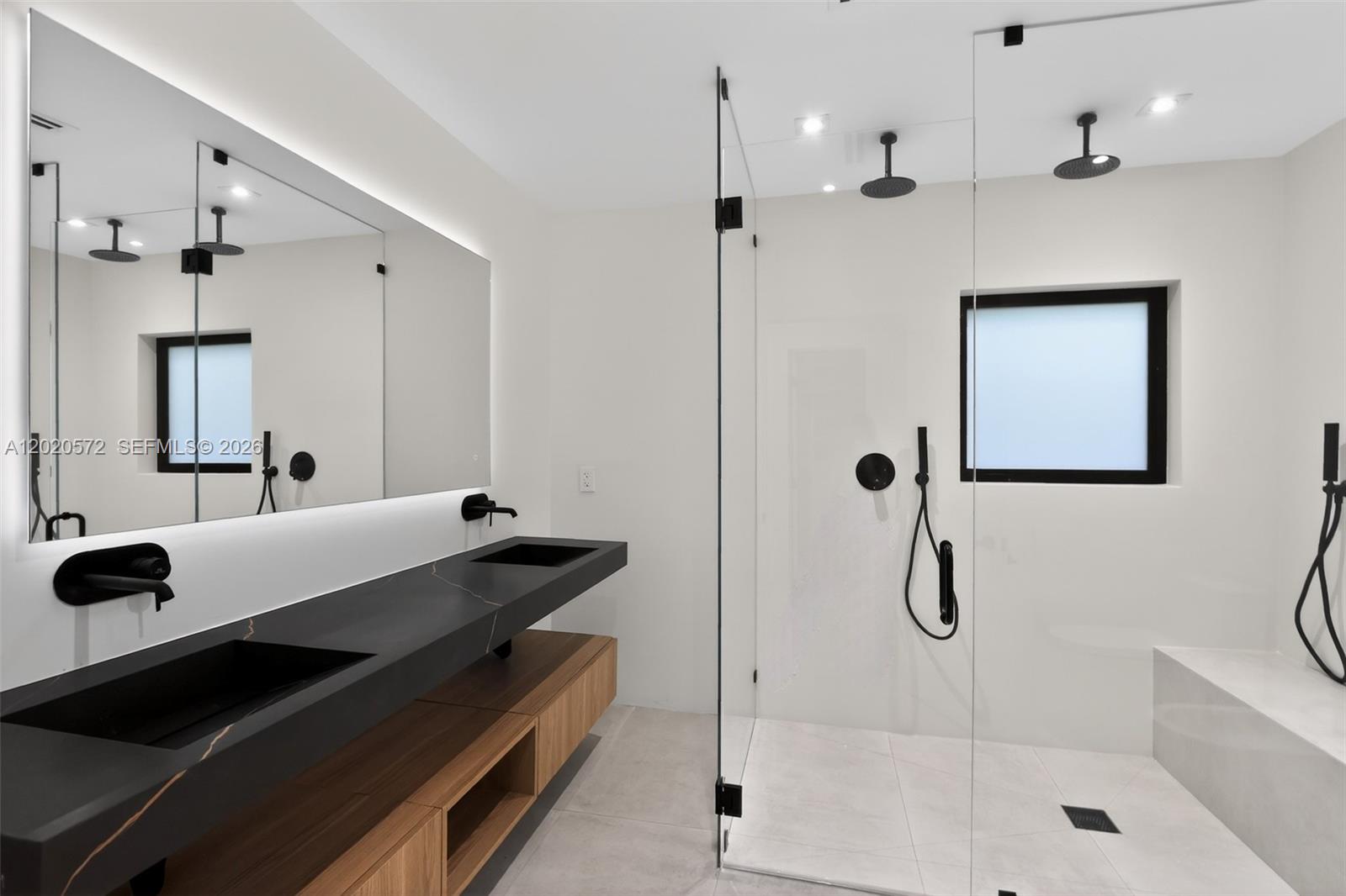 439 Hardee Road Coral Gables, FL 33146 - Photo 17 of 35 a bathroom with a sink and a mirror