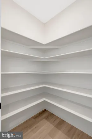 a view of a room with racks on the wall