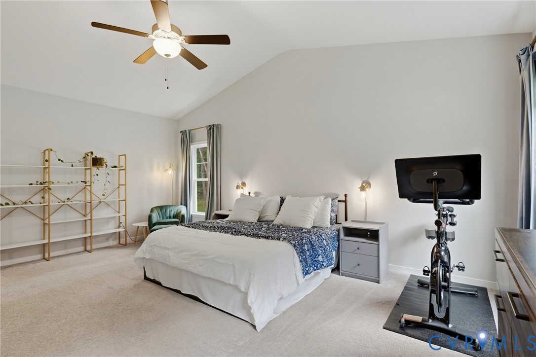 3741 Boundary Run Road Gum Spring, VA 23065 - Photo 18 of 36 Vaulted ceiling with a ceiling fan, neutral carpet