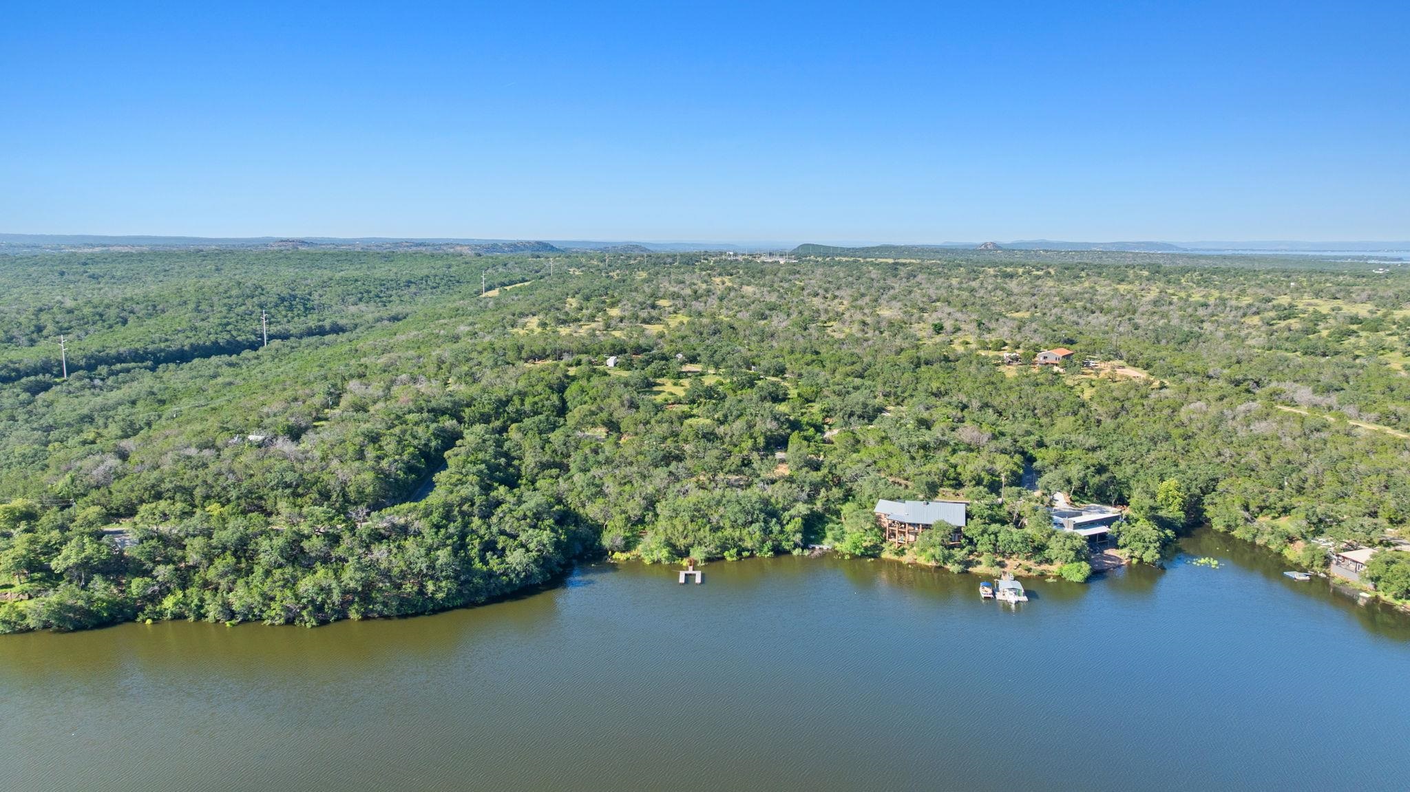 Tbd Sunset Cliff Road Burnet, TX 78611 - Photo 13 of 23 a view of a lake with an outdoor space