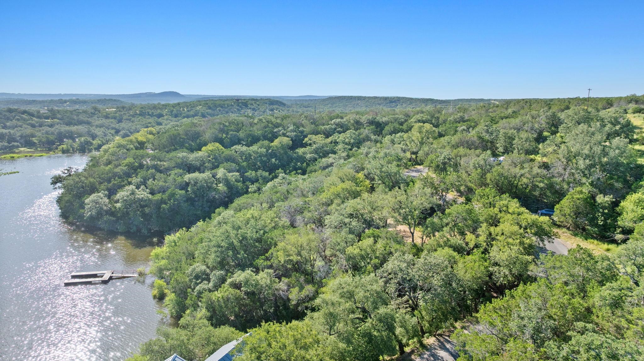 Tbd Sunset Cliff Road Burnet, TX 78611 - Photo 21 of 23 an aerial view of residential houses with outdoor space and trees