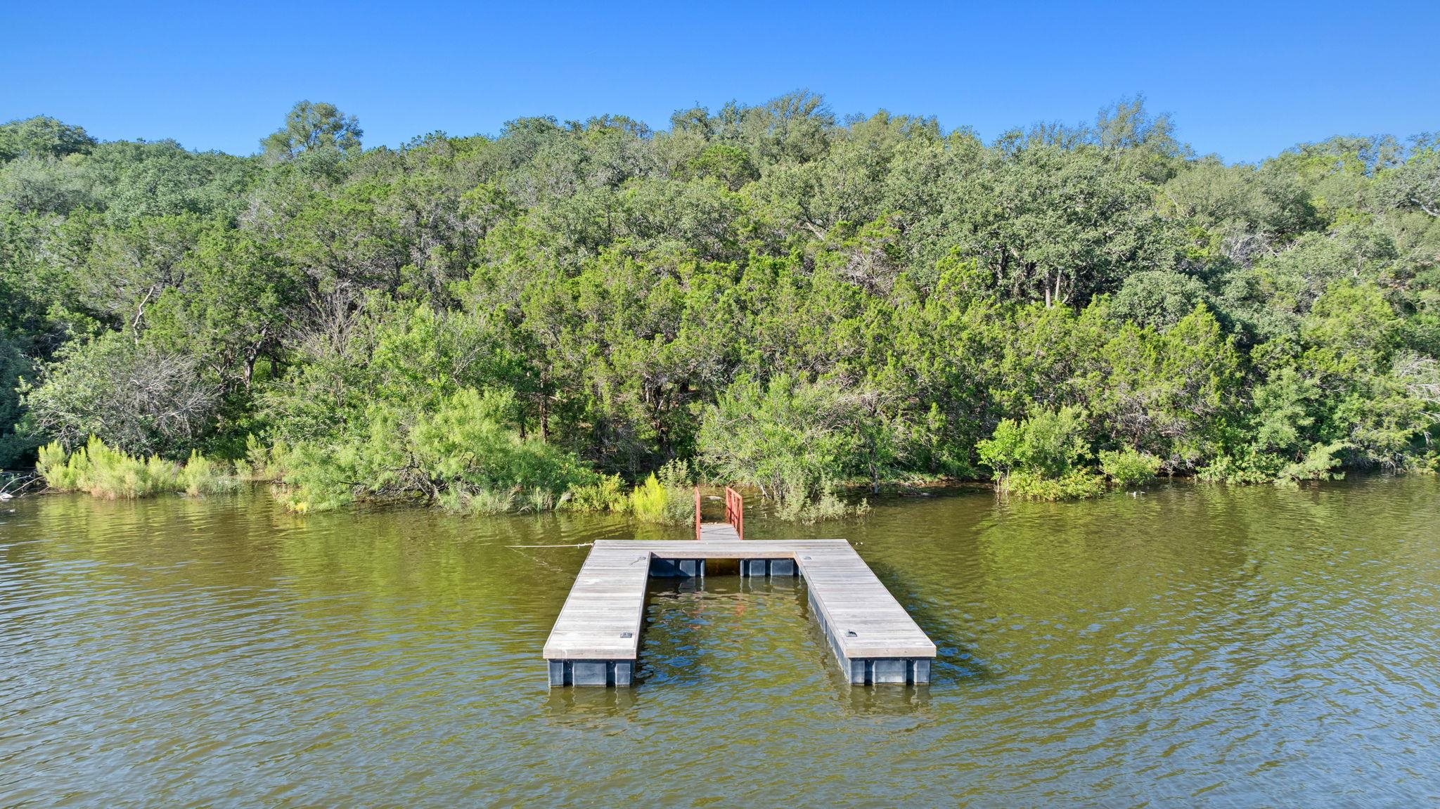 Tbd Sunset Cliff Road Burnet, TX 78611 - Photo 3 of 23 swimming pool with lawn chairs and wooden floor